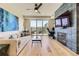 Modern living room with a fireplace and a balcony with natural light at 9019 E Panorama Cir # D218, Englewood, CO 80112