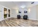 Lobby featuring modern flooring, ambient lighting, comfortable seating, and secure access doors for residents at 9019 E Panorama Cir # D218, Englewood, CO 80112