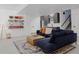 Basement living area showcases wet bar, modern color palette, and comfortable seating at 2645 Eudora St, Denver, CO 80207