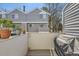 View from balcony with barbecue and view of exterior at 68 S Moline St, Aurora, CO 80012