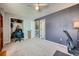 Office/bedroom featuring a fan and large closet at 68 S Moline St, Aurora, CO 80012
