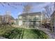 Backyard features a well-maintained lawn, a patio, mature trees, and great landscaping at 1150 W 127Th Ct, Denver, CO 80234