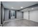 Finished basement bedroom with gray walls, light wood floors, and recessed lighting at 1150 W 127Th Ct, Denver, CO 80234
