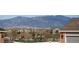 Neighborhood view showcasing local park, common area, with scenic mountain views in the background at 1150 W 127Th Ct, Denver, CO 80234