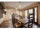 Open-concept dining room offering a large table and chairs, perfect for entertaining guests at 1334 Solitude Ln, Evergreen, CO 80439