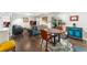Spacious living room featuring hardwood floors, comfortable seating, and abundant natural light, perfect for entertaining at 3485 S Forest St, Denver, CO 80222