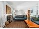 Inviting living room with hardwood floors, cozy seating, and stylish decor, creating a comfortable and welcoming atmosphere at 3485 S Forest St, Denver, CO 80222
