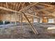 Large open barn interior with dirt floor and wooden beams at 7054 S State Highway 83, Franktown, CO 80116