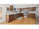 Stylish kitchen featuring stainless steel appliances, tiled backsplash, and ample counter space at 214 N 10Th Ave, Brighton, CO 80601