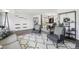 Inviting living room featuring modern furniture, stylish decor, and an open layout to the dining area at 214 N 10Th Ave, Brighton, CO 80601