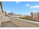 Enjoy this balcony view, showcasing the city skyline against a bright blue sky at 1780 N Washington St # 405, Denver, CO 80203