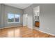 Spacious bedroom with hardwood floors, ensuite bathroom, and closet access at 1780 N Washington St # 405, Denver, CO 80203