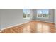 Bright bedroom with beautiful hardwood floors and large windows providing natural light at 1780 N Washington St # 405, Denver, CO 80203
