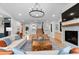 Bright and modern living room with hardwood floors, fireplace, and open layout at 501 Lois Dr, Louisville, CO 80027