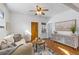 Inviting living room with hardwood floors and a neutral color palette at 4518 Vallejo St, Denver, CO 80211