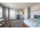 Cozy bedroom with a closet and large window at 190 Olympia Ave, Longmont, CO 80504