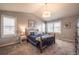 A spacious main bedroom featuring a vaulted ceiling and natural light at 190 Olympia Ave, Longmont, CO 80504