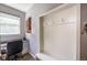 Mud room area with hooks, storage, a built-in desk and a window at 190 Olympia Ave, Longmont, CO 80504