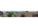 Neighborhood rooftop view in front of mountain backdrop at 190 Olympia Ave, Longmont, CO 80504