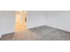 Bedroom featuring neutral carpeting and a closet nearby at 6388 Oak Ct # 203, Arvada, CO 80004