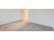 Bedroom featuring neutral carpeting and a closet nearby at 6388 Oak Ct # 203, Arvada, CO 80004