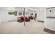 Spacious finished basement with neutral carpet, storage, and living area at 29881 E 128Th Ave, Commerce City, CO 80022
