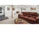 Finished basement with living area, laundry, and neutral carpet at 29881 E 128Th Ave, Commerce City, CO 80022