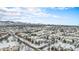Expansive winter aerial view of a residential area with snow-covered houses and streets at 8358 S Independence Cir # 105, Littleton, CO 80128