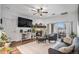 Cozy living room with a fireplace, a plush seating area, and sliding glass doors leading to the patio at 8358 S Independence Cir # 105, Littleton, CO 80128