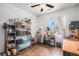 Functional office with large window, lots of storage space, and views of the outdoors at 8358 S Independence Cir # 105, Littleton, CO 80128