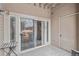 Private outdoor patio space with sliding door and adjacent to a convenient storage room at 8358 S Independence Cir # 105, Littleton, CO 80128