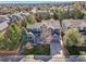 Stunning aerial view of this beautiful property showcasing mature trees and lush landscaping at 2660 Timberchase Trl, Highlands Ranch, CO 80126