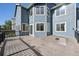 View of the beautiful backyard deck with black railings, perfect for entertaining or relaxing at 2660 Timberchase Trl, Highlands Ranch, CO 80126