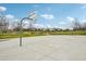 Community basketball court, ideal for sports and recreation, set against a backdrop of greenery at 2660 Timberchase Trl, Highlands Ranch, CO 80126