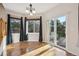Dining Area features natural light with windows and a sliding glass door to the deck at 2660 Timberchase Trl, Highlands Ranch, CO 80126