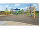 Community playground featuring climbing structures, slides, and swings for outdoor fun at 2660 Timberchase Trl, Highlands Ranch, CO 80126