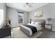 Bright bedroom featuring a comfortable bed and stylish decor at 10401 W Lehigh Ave, Denver, CO 80235