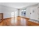 Bright living room featuring hardwood floors and a view to the exterior at 10401 W Lehigh Ave, Denver, CO 80235