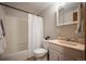 Clean bathroom with shower-tub, tile floors, toilet, and vanity at 10039 S Turkey Creek Rd, Morrison, CO 80465