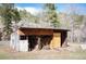 Exterior view showcasing a wood shed at 10039 S Turkey Creek Rd, Morrison, CO 80465