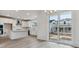 Modern kitchen with stainless steel appliances and a sleek island at 9297 Truckee Ct, Commerce City, CO 80022