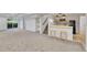 Finished basement with plush carpeting, wet bar, and recessed lighting at 7018 Reed Ct, Arvada, CO 80003