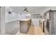 Basement bar area with butcher block counter and stainless Galanz refrigerator at 7018 Reed Ct, Arvada, CO 80003