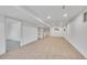 Spacious finished basement with plush carpeting and updated bar area at 7018 Reed Ct, Arvada, CO 80003