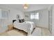 Bright bedroom with updated lighting, and decorative touches at 7018 Reed Ct, Arvada, CO 80003