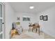 Bright office featuring a modern desk, decor, chair, and hardwood flooring at 7018 Reed Ct, Arvada, CO 80003