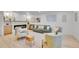 Bright living room featuring a fireplace, modern furniture, and neutral color palette at 7018 Reed Ct, Arvada, CO 80003
