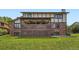 Spacious backyard featuring a large covered patio, perfect for outdoor entertaining and relaxation at 7863 W Friend Dr, Littleton, CO 80128