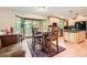 Eat-in kitchen with bay window and a table perfect for a Gathering meal at 7863 W Friend Dr, Littleton, CO 80128