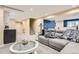 This living room offers recessed lighting, carpeted floors, and comfortable seating at 7863 W Friend Dr, Littleton, CO 80128